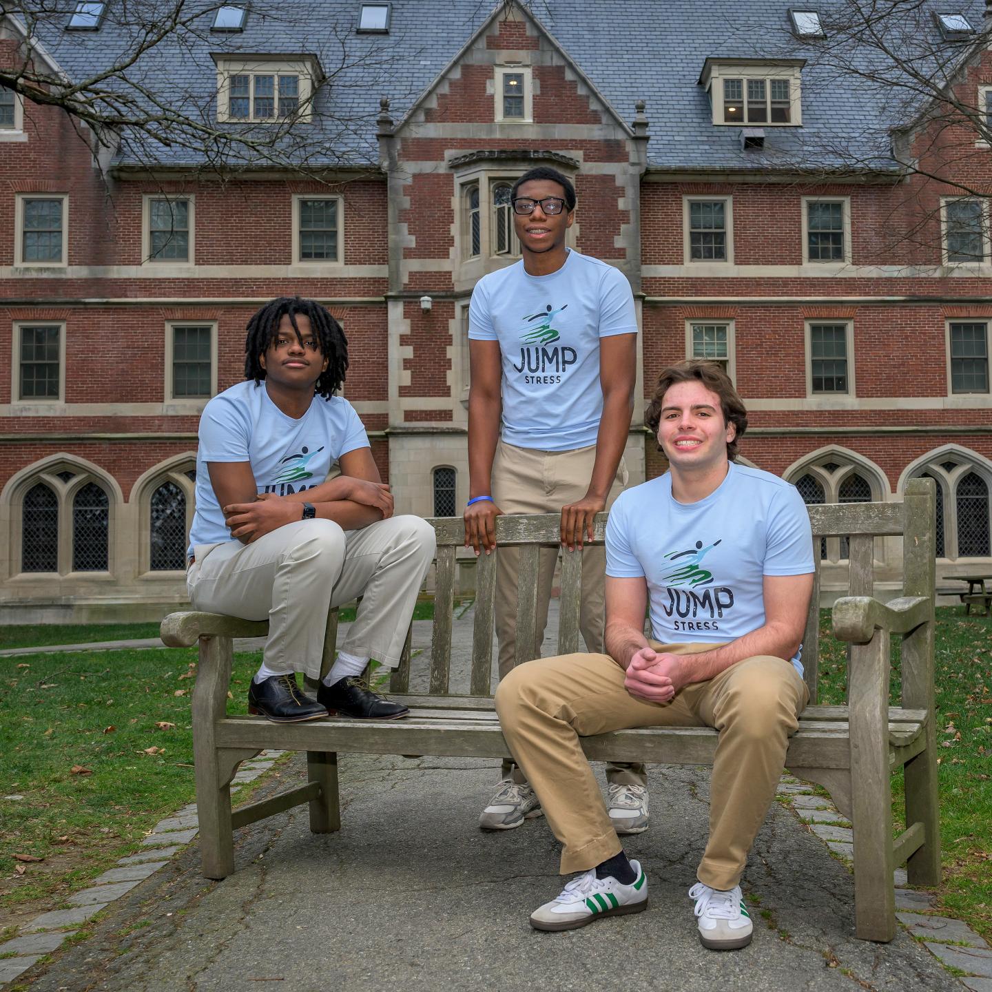 Linus, Josh and Ethan on bench in front of Coit