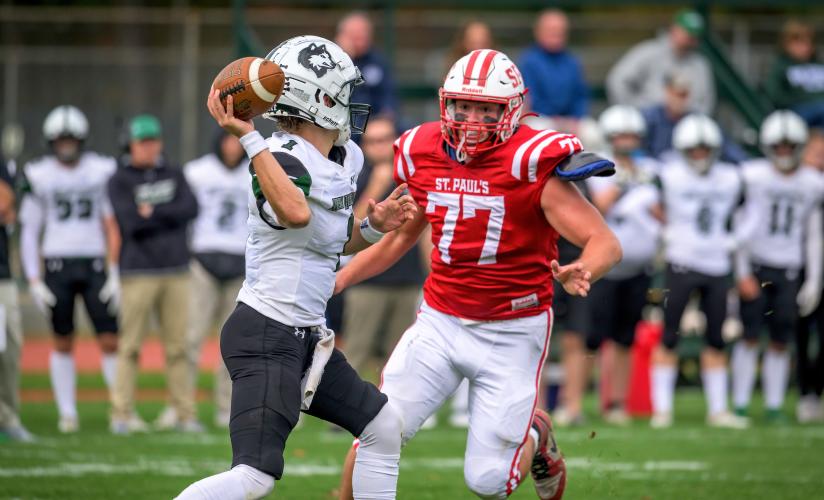 Grant Winter '24 puts pressure on opposing quarterback during a 2023 game