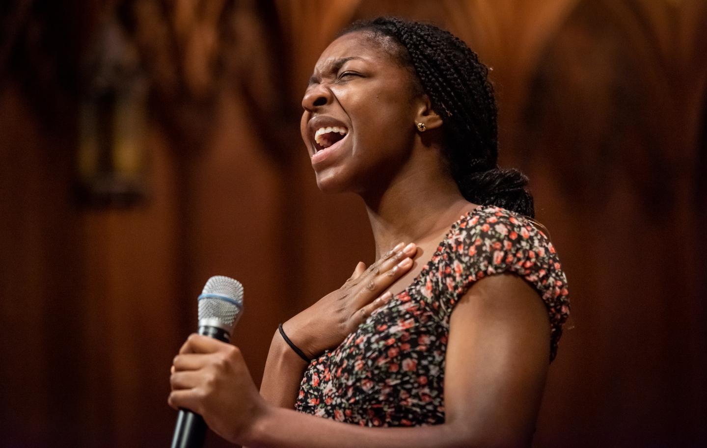 Nife Joshua ’22 singing in Chapel