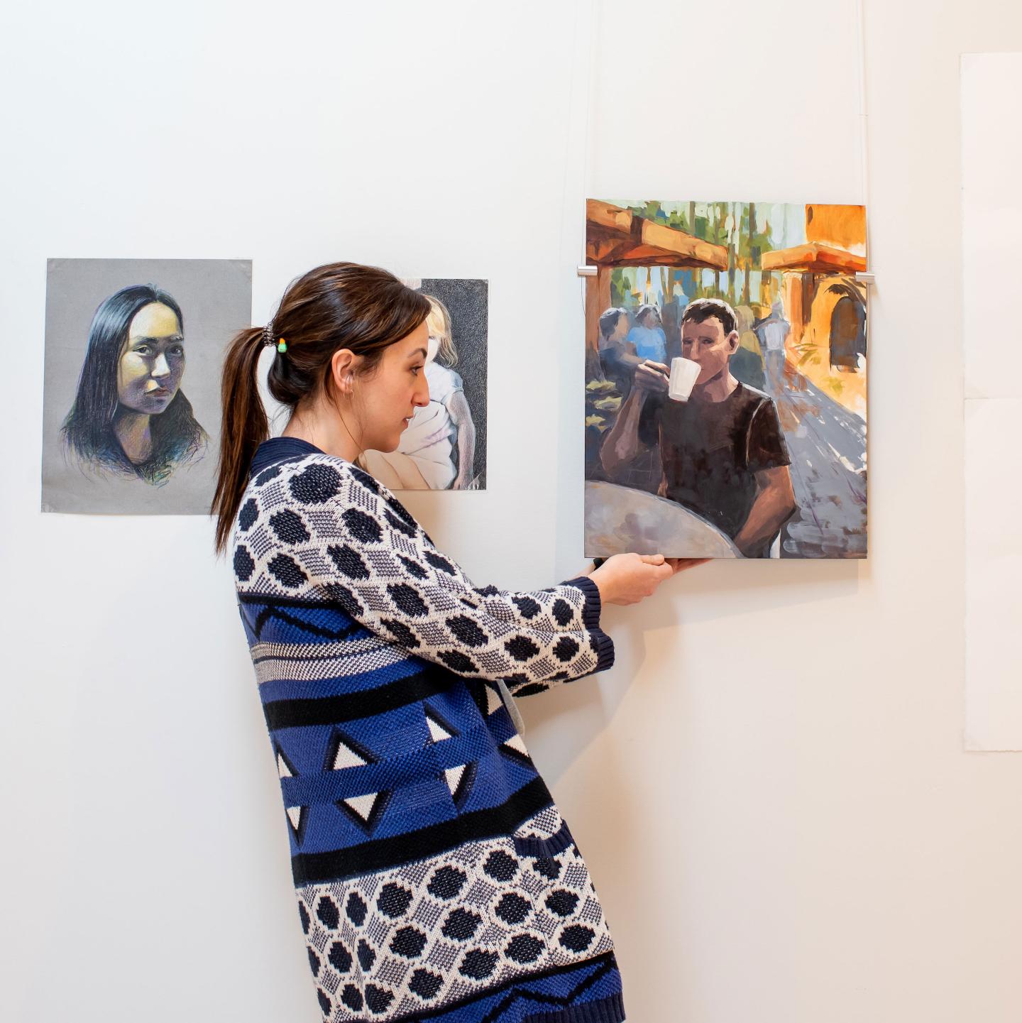 Lindsay Bolduc with an art installation in Crumpacker Gallery