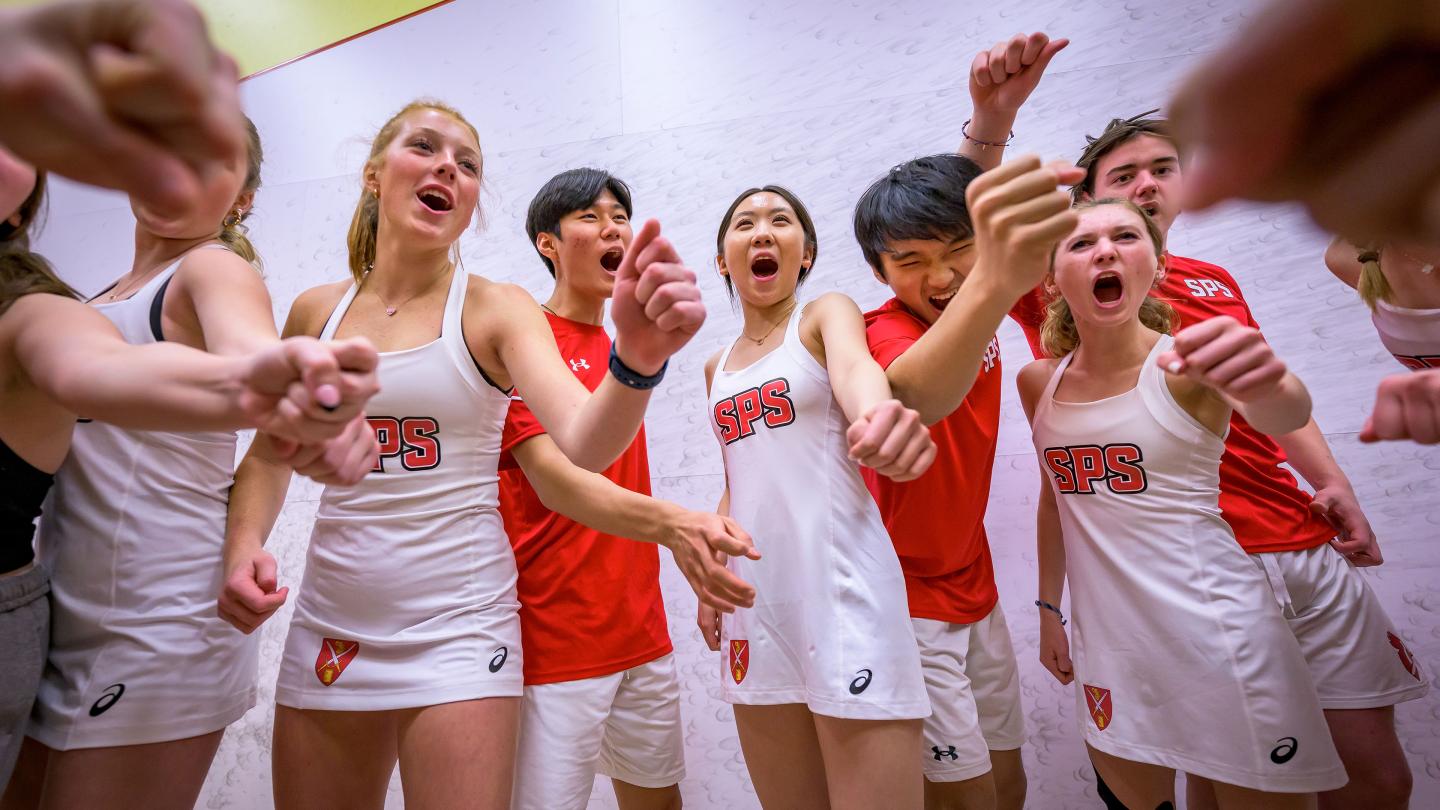 Squash team celebrating