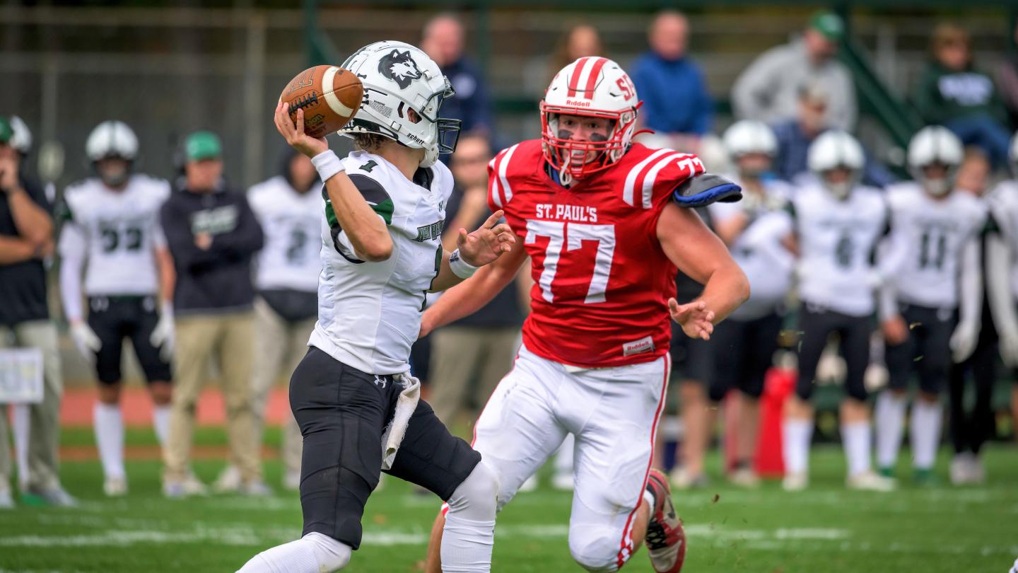 Grant Winter '24 puts pressure on opposing quarterback during a 2023 game